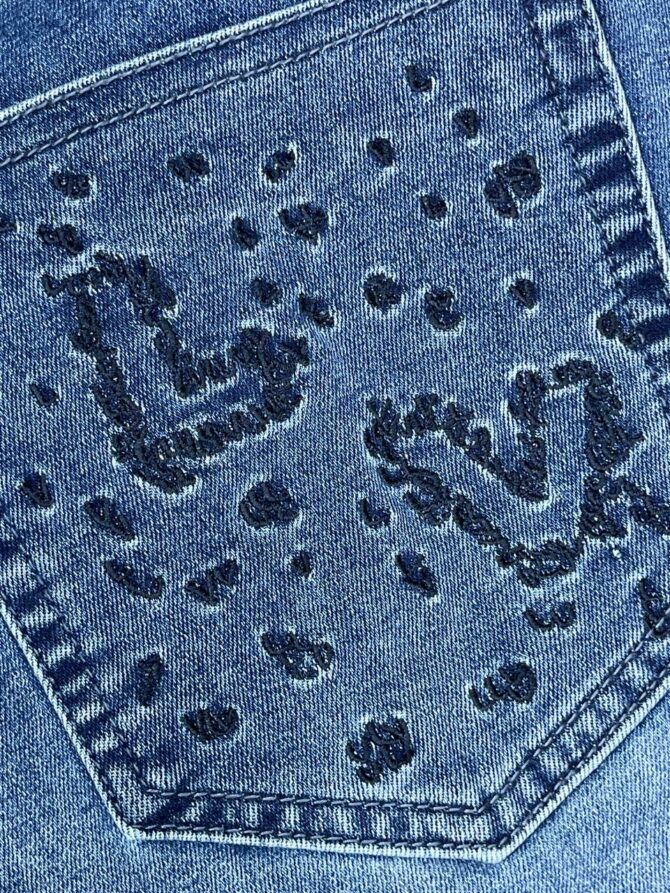 Джинсы Louis Vuitton