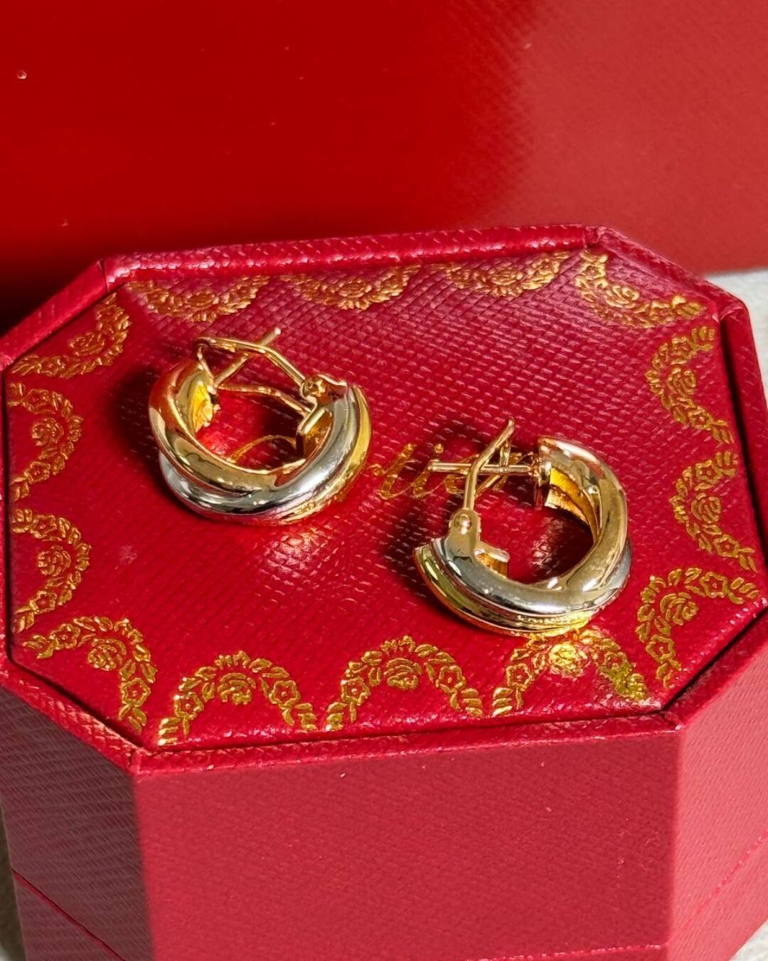 Серьги Cartier Trinity