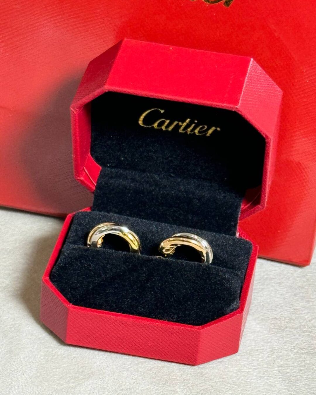 Серьги Cartier Trinity