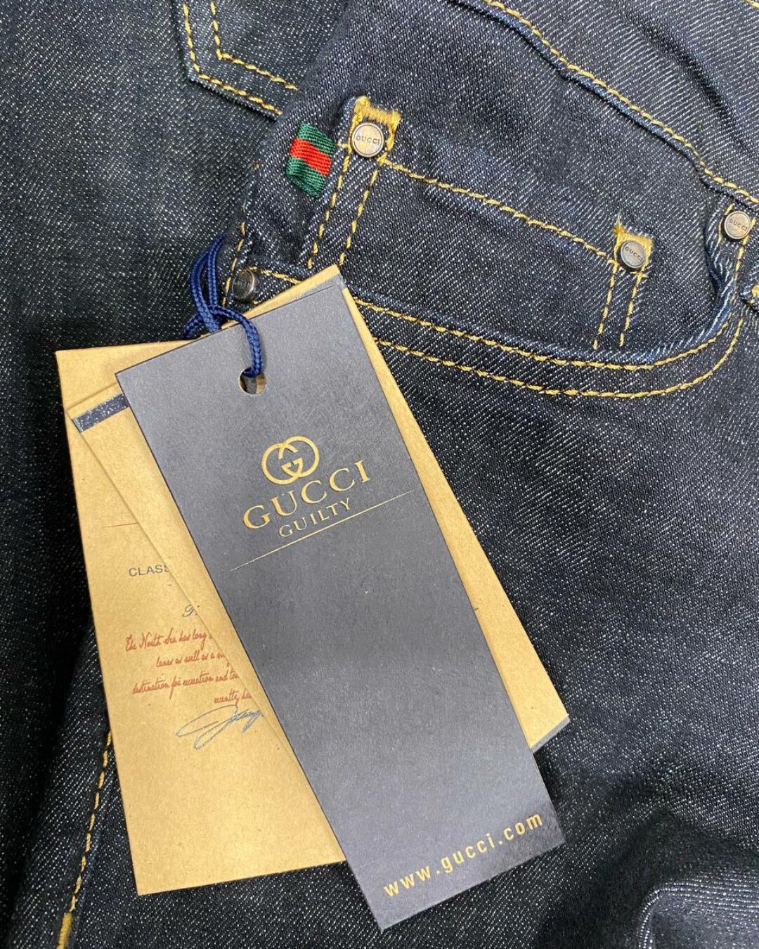 Джинсы Gucci
