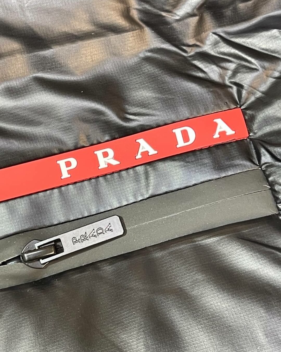 Пуховик Prada