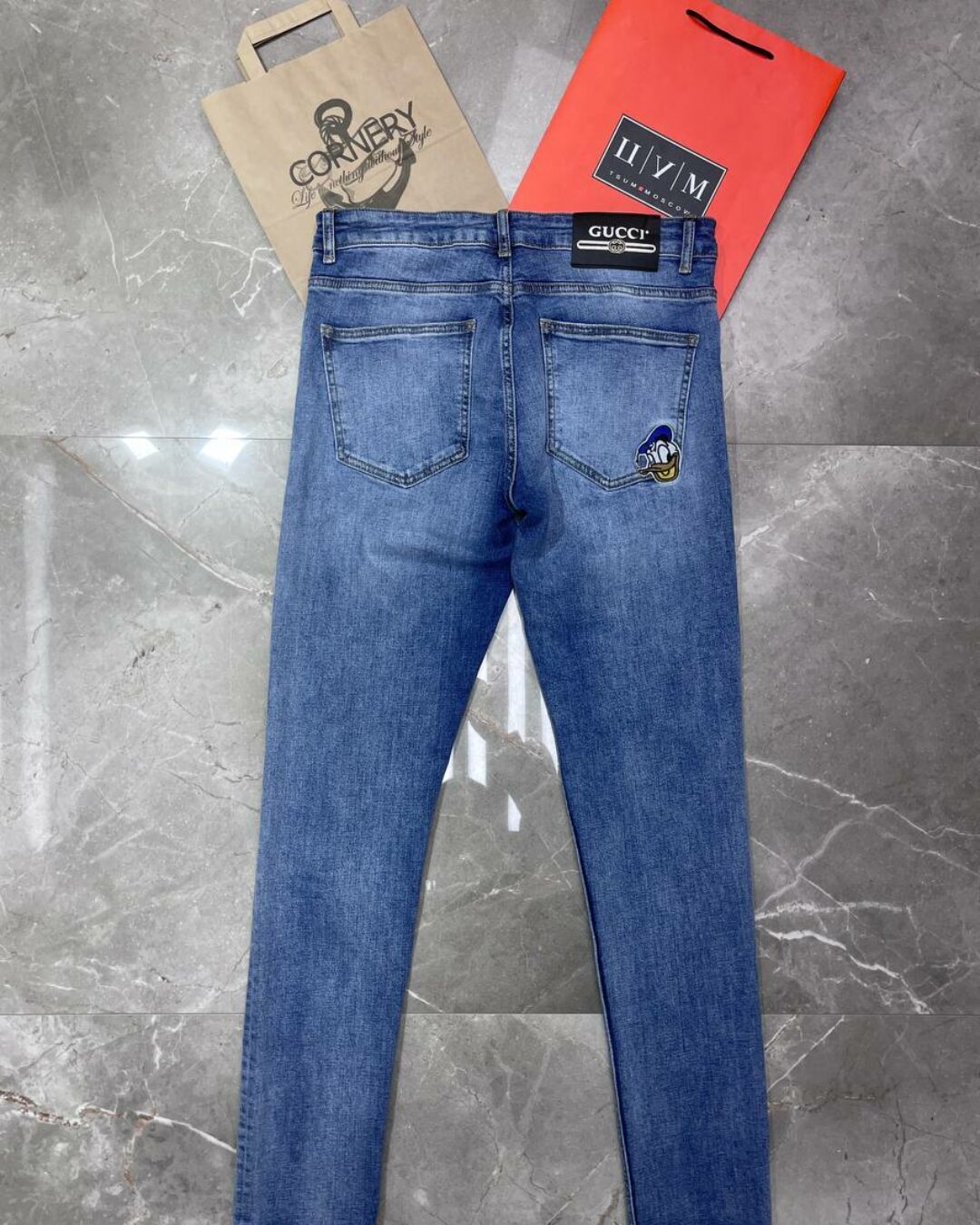 Джинсы Gucci
