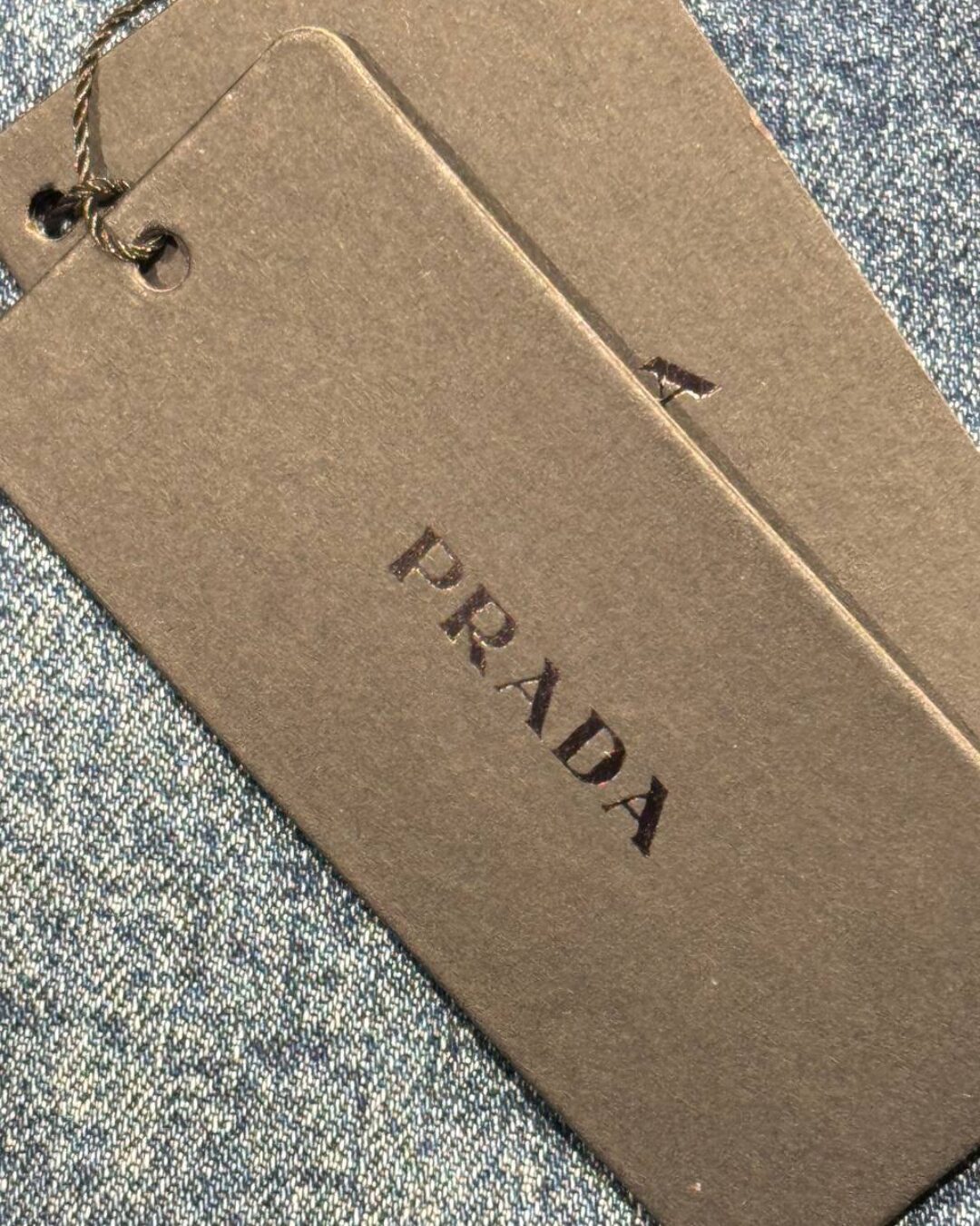 Джинсы Prada