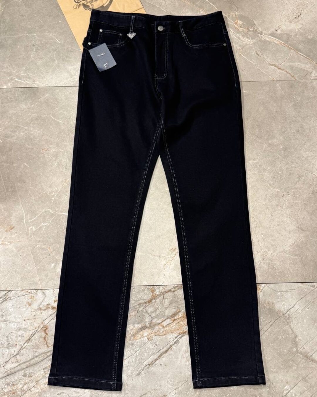 Джинсы Prada